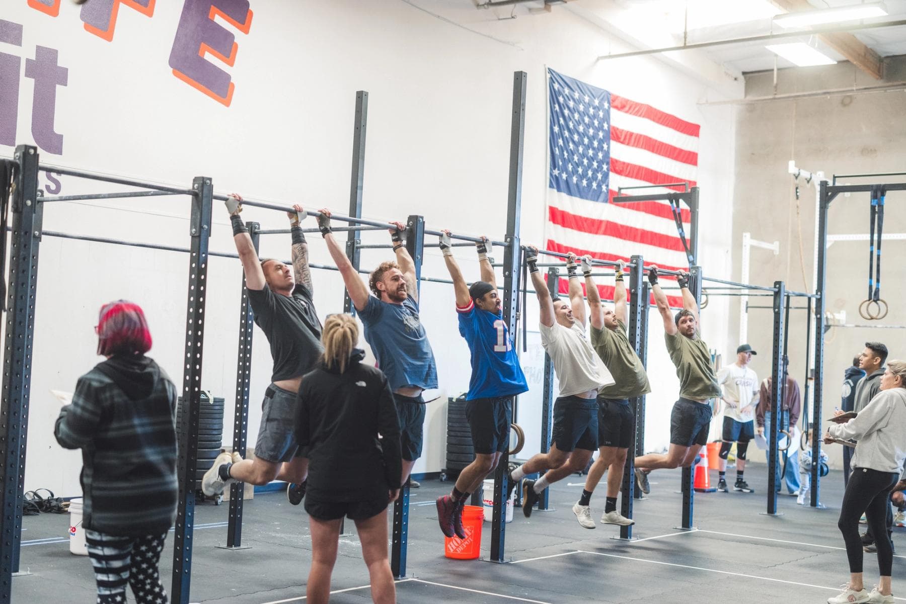 One Life CrossFit members training together on the pull-up rig