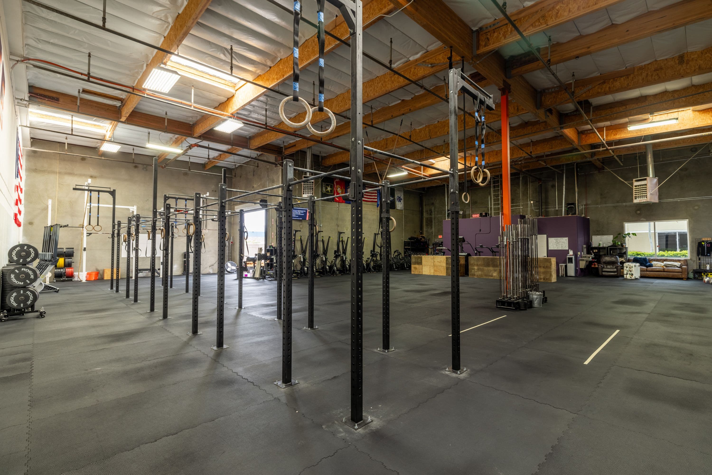 One Life CrossFit training floor with natural light and organized equipment
